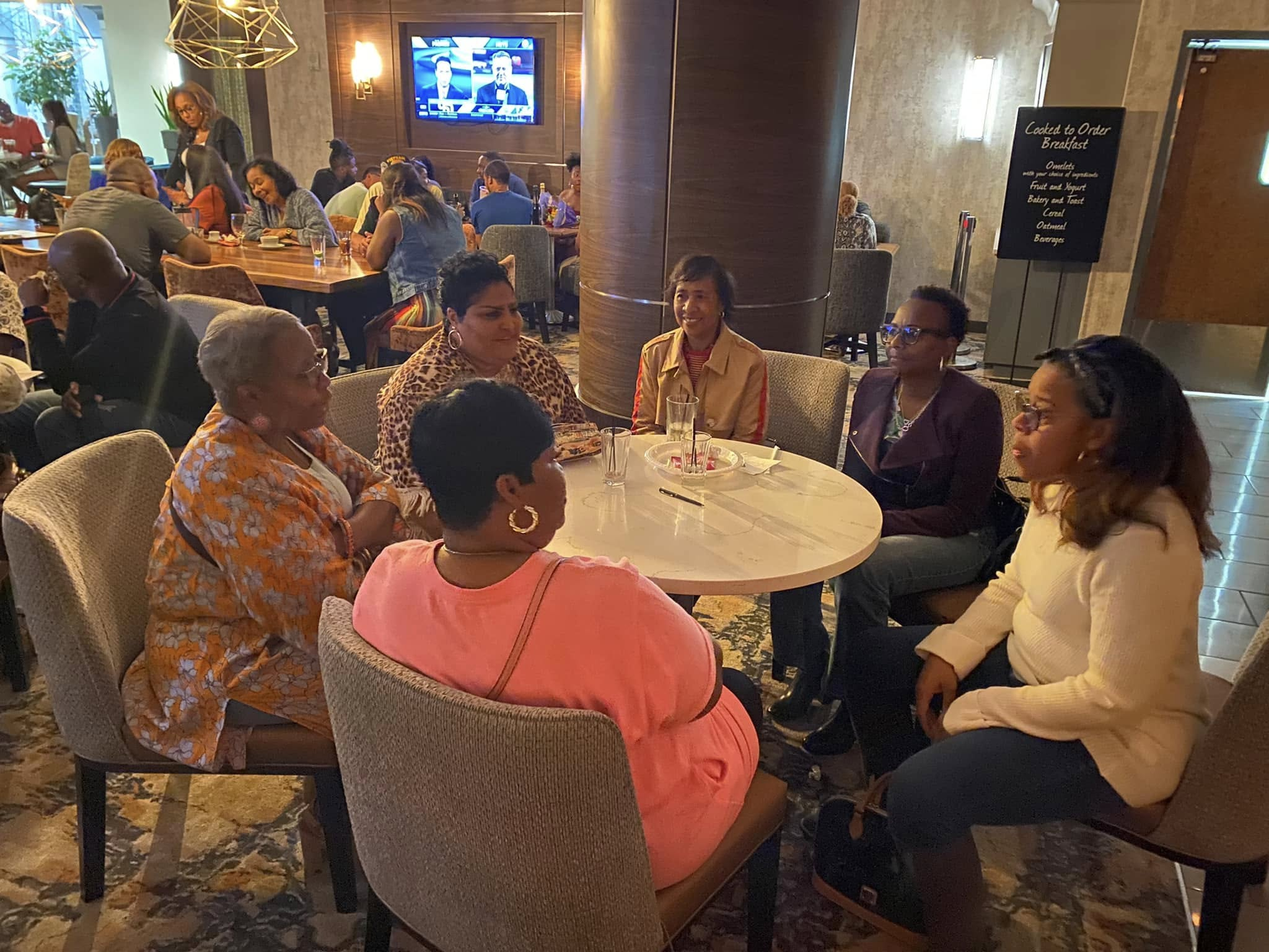 Pastors' spouses connecting in a small-group conversation
